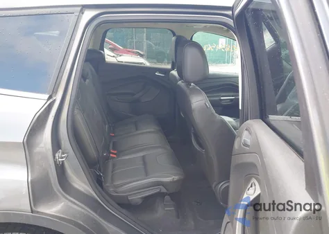 2013 Ford Escape Titanium z USA, uszkodzony, nr VIN 1FMCU9J96DUD84900